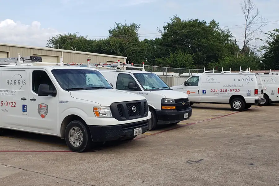 HVAC service vans parked at McKinney TX