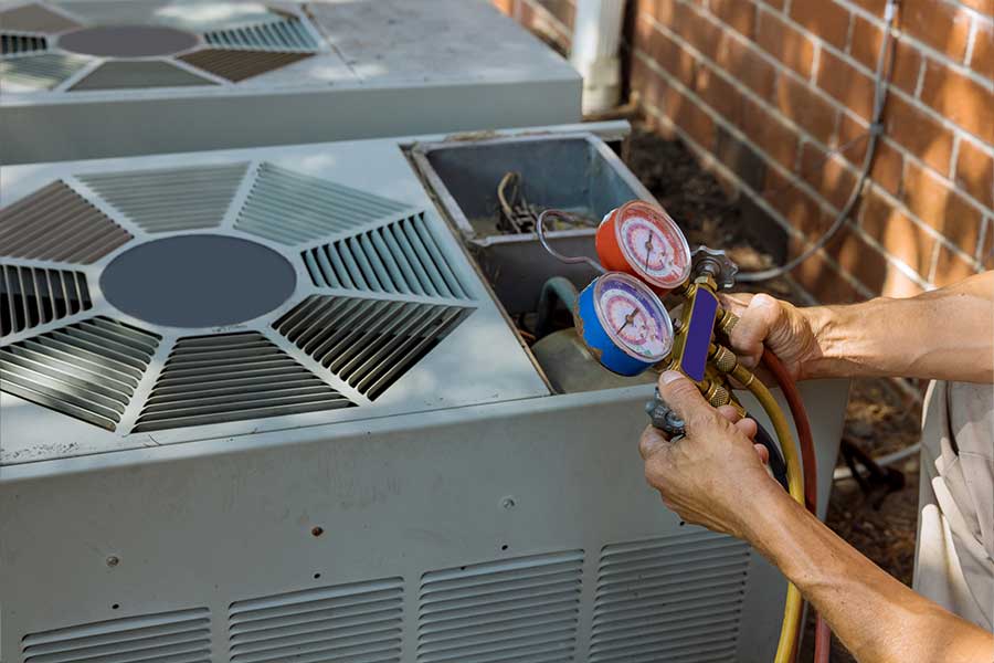 Technician checking an outdoor AC unit during an HVAC inspection in McKinney, TX
